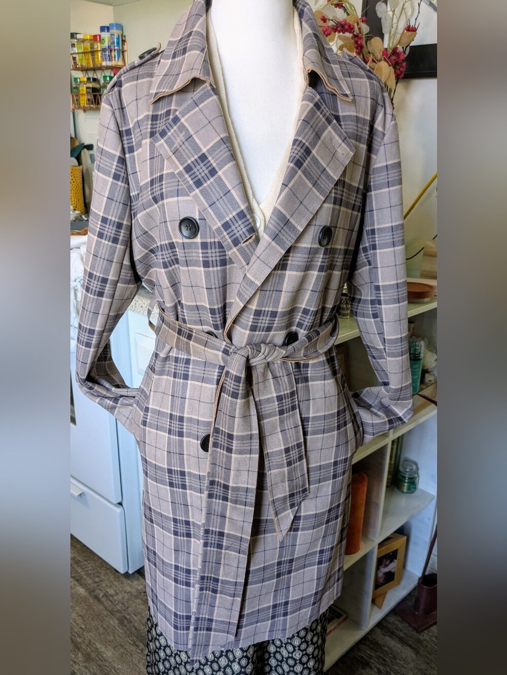 Beautifully soft and stylish Solitaire plaid trench coat in a versatile neutral